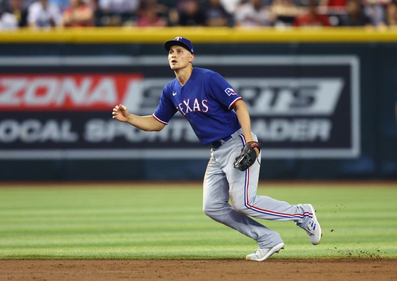 Aug 22, 2023; Phoenix, Arizona, USA; Texas Rangers shortstop Corey Seager in the second inning against the Arizona Diamondbacks at Chase Field. Mandatory Credit: Mark J. Rebilas-USA TODAY Sports