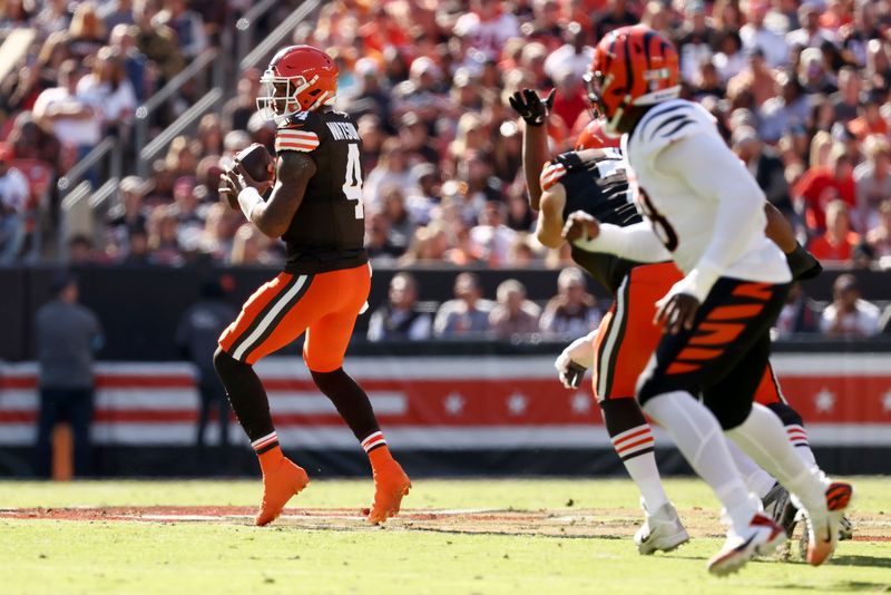 Cleveland Browns quarterback Deshaun Watson (4) looks to throw the ball during an NFL football game against the Cincinnati Bengals, Sunday, Oct. 20, 2024, in Cleveland. (AP Photo/Kirk Irwin)