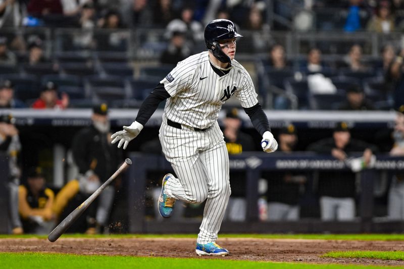 Sep 29, 2024; Bronx, New York, USA; New York Yankees outfielder Alex Verdugo (24) hits a two RBI single against the Pittsburgh Pirates during the eighth inning at Yankee Stadium. Mandatory Credit: John Jones-Imagn Images