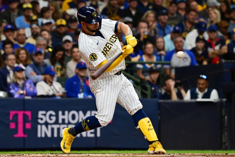 Oct 3, 2024; Milwaukee, Wisconsin, USA; Milwaukee Brewers catcher Gary Sanchez (99) hits a double in the second inning against the New York Mets during game three of the Wildcard round for the 2024 MLB Playoffs at American Family Field. Mandatory Credit: Benny Sieu-Imagn Images