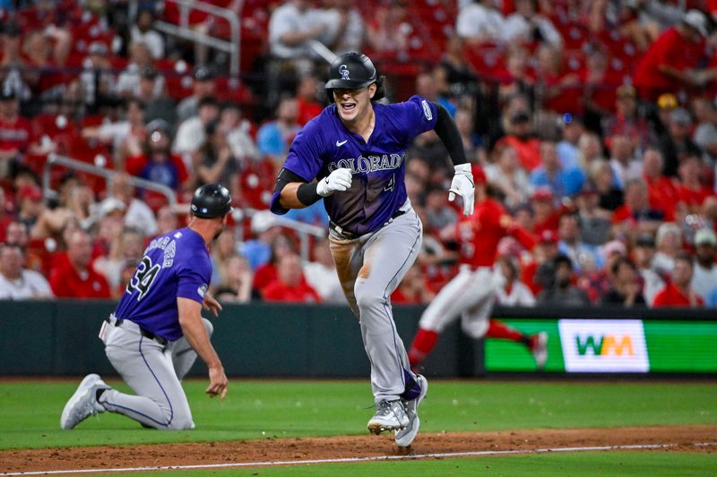 Jun 7, 2024; St. Louis, Missouri, USA;  Colorado Rockies right fielder Michael Toglia (4) runs home to score on a throwing error by St. Louis Cardinals second baseman Nolan Gorman (not pictured) after hitting a three run triple during the fourth inning at Busch Stadium. Mandatory Credit: Jeff Curry-USA TODAY Sports