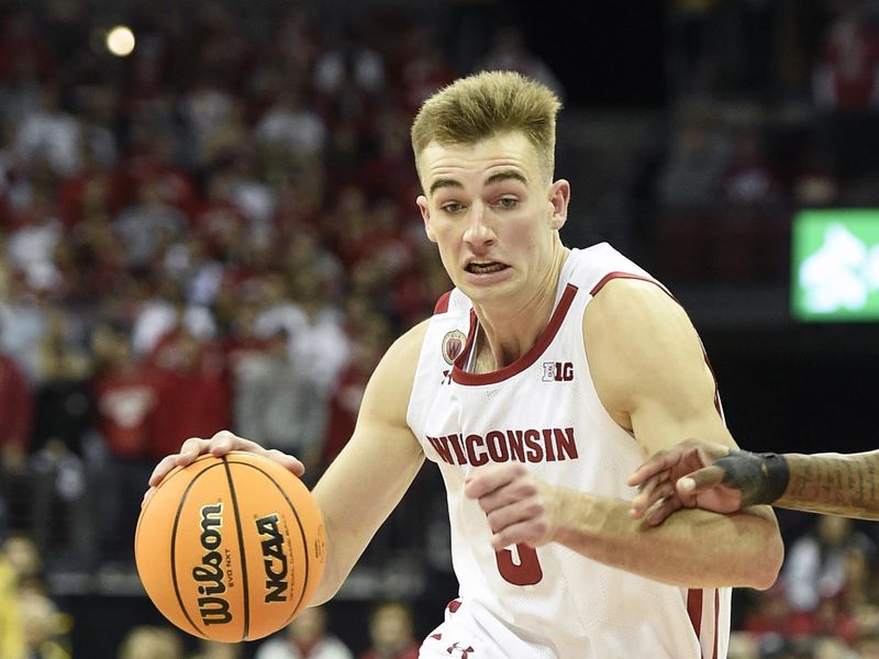 Dec 6, 2022; Madison, Wisconsin, USA;  Wisconsin Badgers forward Tyler Wahl (5) drives to the basket against the Maryland Terrapins during the second half at the Kohl Center. Mandatory Credit: Kayla Wolf-USA TODAY Sports