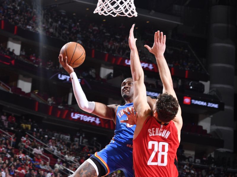HOUSTON, TX - DECEMBER 1: Jalen Williams #8 of the Oklahoma City Thunder dribbles the ball during the game against the Houston Rockets  on December 1, 2024 at the Toyota Center in Houston, Texas. NOTE TO USER: User expressly acknowledges and agrees that, by downloading and or using this photograph, User is consenting to the terms and conditions of the Getty Images License Agreement. Mandatory Copyright Notice: Copyright 2024 NBAE (Photo by Logan Riely/NBAE via Getty Images)