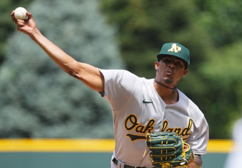 Jul 30, 2023; Denver, Colorado, USA; Oakland Athletics starting pitcher Luis Medina (46) pitches in the first inning against the Colorado Rockies at Coors Field. Mandatory Credit: Ron Chenoy-USA TODAY Sports