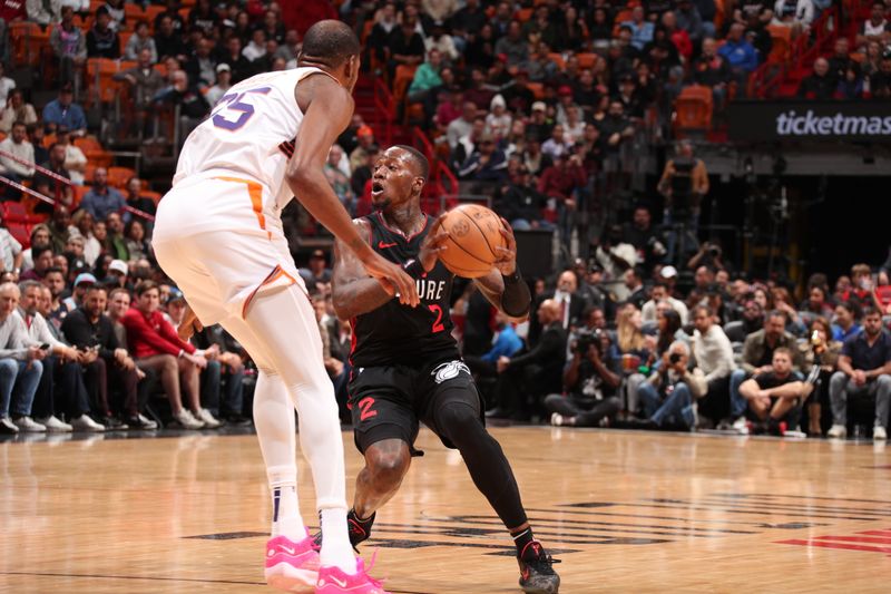 MIAMI, FL - JANUARY 29: Terry Rozier III #2 of the Miami Heat handles the ball during the game against the Phoenix Suns on January 29, 2024 at Kaseya Center in Miami, Florida. NOTE TO USER: User expressly acknowledges and agrees that, by downloading and or using this Photograph, user is consenting to the terms and conditions of the Getty Images License Agreement. Mandatory Copyright Notice: Copyright 2024 NBAE (Photo by Issac Baldizon/NBAE via Getty Images)