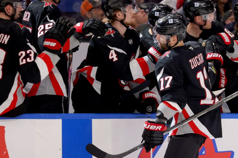 Apr 5, 2025; Buffalo, New York, USA;  Buffalo Sabres left wing Jason Zucker (17) celebrates his goal with teammates during the third period against the Tampa Bay Lightning at KeyBank Center. Mandatory Credit: Timothy T. Ludwig-Imagn Images