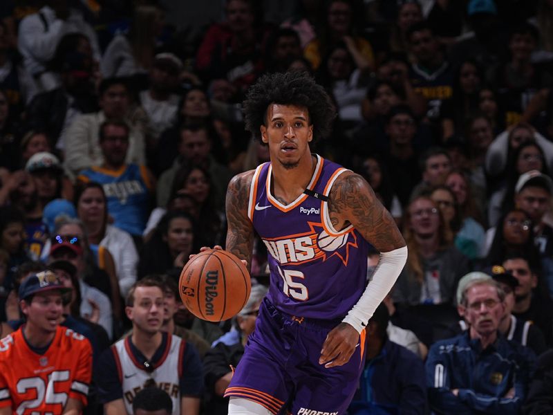 DENVER, CO - OCTOBER 13: Jalen Bridges #15 of the Phoenix Suns dribbles the ball during the game against the Denver Nuggets on October 13, 2024 at Ball Arena in Denver, Colorado. NOTE TO USER: User expressly acknowledges and agrees that, by downloading and/or using this Photograph, user is consenting to the terms and conditions of the Getty Images License Agreement. Mandatory Copyright Notice: Copyright 2024 NBAE (Photo by Bart Young/NBAE via Getty Images)