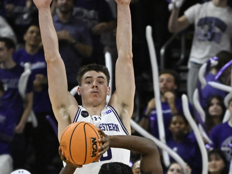 Jan 27, 2024; Evanston, Illinois, USA; Northwestern Wildcats guard Brooks Barnhizer (13) defends against Ohio State Buckeyes guard Bruce Thornton (2) during the second half  at Welsh-Ryan Arena. Mandatory Credit: Matt Marton-USA TODAY Sports