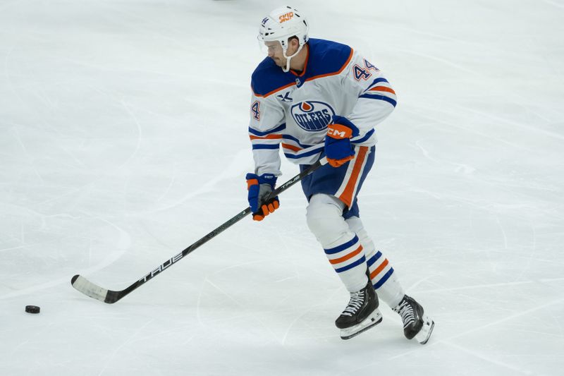 Nov 19, 2024; Ottawa, Ontario, CAN; Edmonton Oilers defenseman Joshua Brown (44) skates with the puck in the third period against the Ottawa Senators at the Canadian Tire Centre. Mandatory Credit: Marc DesRosiers-Imagn Images