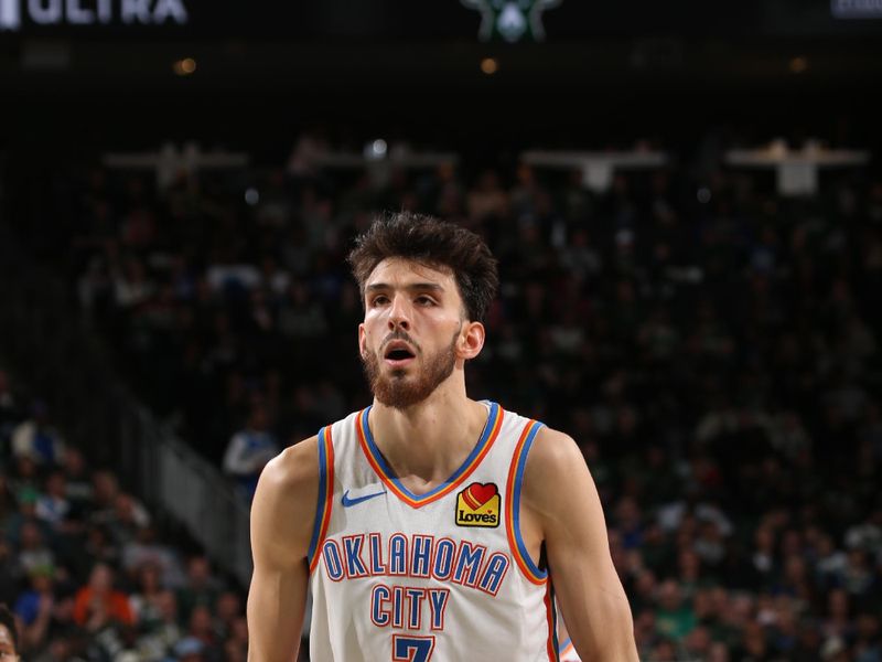 MILWAUKEE, WI - MARCH 24: Chet Holmgren #7 of the Oklahoma City Thunder shoots a free throw during the game against the Milwaukee Bucks on March 24, 2024 at the Fiserv Forum Center in Milwaukee, Wisconsin. NOTE TO USER: User expressly acknowledges and agrees that, by downloading and or using this Photograph, user is consenting to the terms and conditions of the Getty Images License Agreement. Mandatory Copyright Notice: Copyright 2024 NBAE (Photo by Gary Dineen/NBAE via Getty Images).