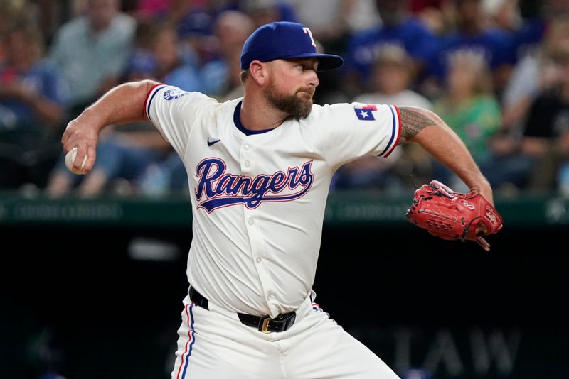 Aug 31, 2024; Arlington, Texas, USA; Texas Rangers relief pitcher Kirby Yates (39) throws to the plate during the ninth inning against the Oakland Athletics at Globe Life Field. Mandatory Credit: Raymond Carlin III-USA TODAY Sports