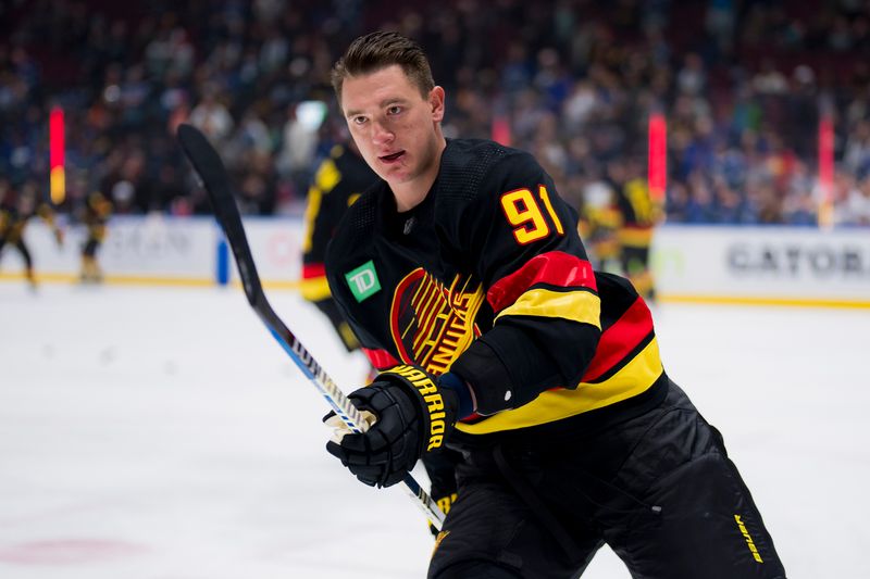 Feb 15, 2024; Vancouver, British Columbia, CAN;  Vancouver Canucks defenseman Nikita Zadorov (91) skates during warm up prior to a game against the Detroit Red Wings at Rogers Arena.  Mandatory Credit: Bob Frid-USA TODAY Sports