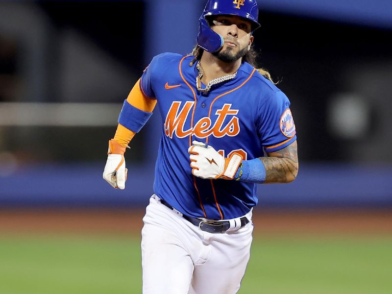 Aug 14, 2023; New York City, New York, USA; New York Mets second baseman Jonathan Arauz (19) rounds the bases after hitting a two run home run against the Pittsburgh Pirates during the fourth inning at Citi Field. Mandatory Credit: Brad Penner-USA TODAY Sports