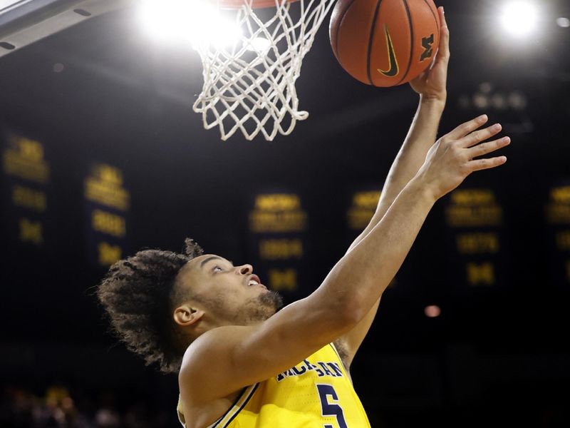 Jan 15, 2024; Ann Arbor, Michigan, USA; Michigan Wolverines forward Terrance Williams II (5) shoots in the first half against the Ohio State Buckeyes at Crisler Center. Mandatory Credit: Rick Osentoski-USA TODAY Sports