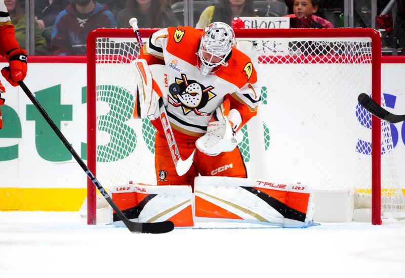 Oct 18, 2024; Denver, Colorado, USA; Anaheim Ducks goaltender Lukas Dostal (1) makes a save in the first period against the Colorado Avalanche at Ball Arena. Mandatory Credit: Ron Chenoy-Imagn Images