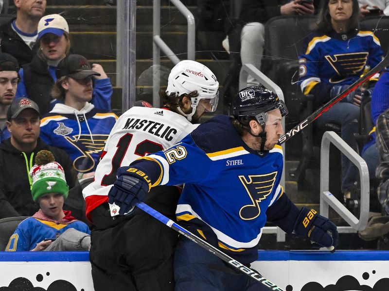 Dec 14, 2023; St. Louis, Missouri, USA;  St. Louis Blues right wing Kevin Hayes (12) checks Ottawa Senators center Mark Kastelic (12) during the second period at Enterprise Center. Mandatory Credit: Jeff Curry-USA TODAY Sports