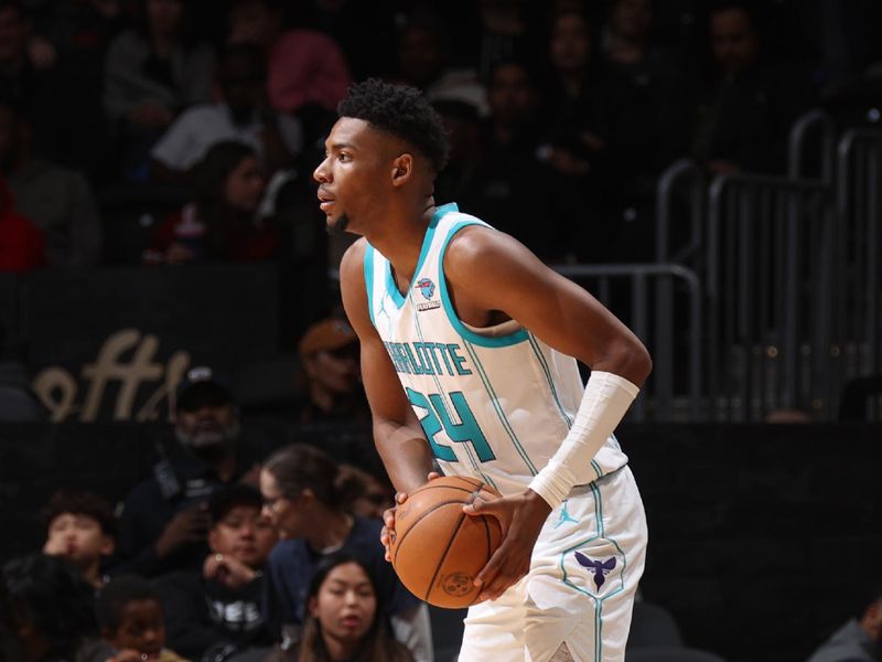 WASHINGTON, DC -? MARCH 8:  Brandon Miller #24 of the Charlotte Hornets handles the ball during the game  on March 8, 2024 at Capital One Arena in Washington, DC. NOTE TO USER: User expressly acknowledges and agrees that, by downloading and or using this Photograph, user is consenting to the terms and conditions of the Getty Images License Agreement. Mandatory Copyright Notice: Copyright 2024 NBAE (Photo by Stephen Gosling/NBAE via Getty Images)