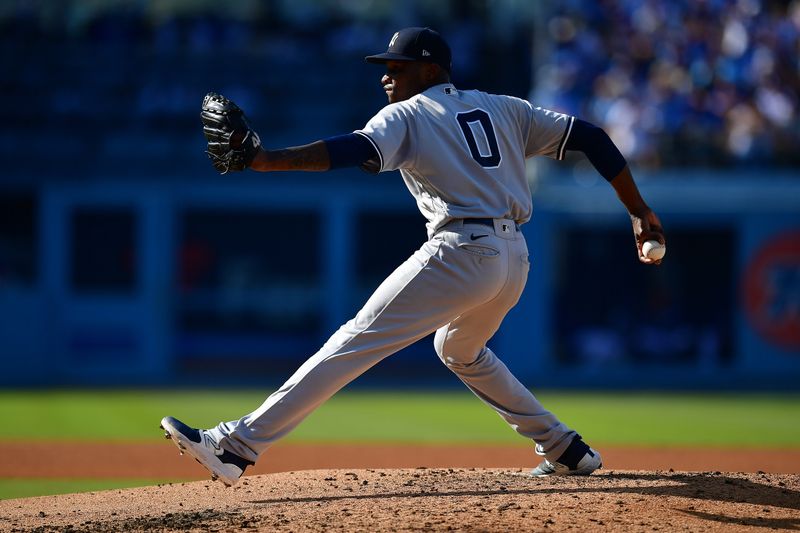 Jun 4, 2023; Los Angeles, California, USA; New York Yankees starting pitcher Domingo German (0) throws against the Los Angeles Dodgers during the fourth inning at Dodger Stadium. Mandatory Credit: Gary A. Vasquez-USA TODAY Sports