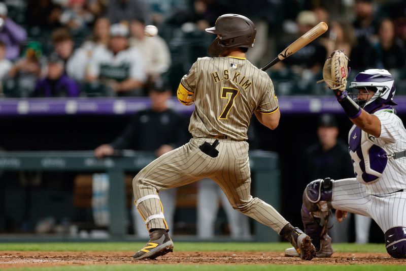 Apr 24, 2024; Denver, Colorado, USA; San Diego Padres shortstop Ha-Seong Kim (7) leans away from a pitch in the eighth inning against the Colorado Rockies at Coors Field. Mandatory Credit: Isaiah J. Downing-USA TODAY Sports