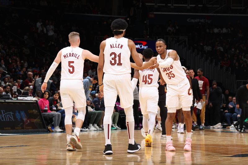 WASHINGTON, DC -? FEBRUARY 25: The Cleveland Cavaliers high five during the game against the Washington Wizards on February 25, 2024 at Capital One Arena in Washington, DC. NOTE TO USER: User expressly acknowledges and agrees that, by downloading and or using this Photograph, user is consenting to the terms and conditions of the Getty Images License Agreement. Mandatory Copyright Notice: Copyright 2024 NBAE (Photo by Stephen Gosling/NBAE via Getty Images)