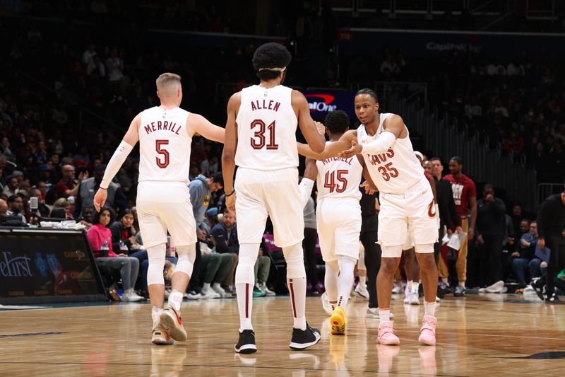 WASHINGTON, DC -? FEBRUARY 25: The Cleveland Cavaliers high five during the game against the Washington Wizards on February 25, 2024 at Capital One Arena in Washington, DC. NOTE TO USER: User expressly acknowledges and agrees that, by downloading and or using this Photograph, user is consenting to the terms and conditions of the Getty Images License Agreement. Mandatory Copyright Notice: Copyright 2024 NBAE (Photo by Stephen Gosling/NBAE via Getty Images)