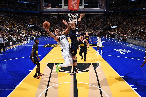 DENVER, CO - NOVEMBER 3: Dwight Powell #7 of the Dallas Mavericks drives to the basket during the game against the Denver Nuggets during the In-Season Tournament on November 3, 2023 at the Ball Arena in Denver, Colorado. NOTE TO USER: User expressly acknowledges and agrees that, by downloading and/or using this Photograph, user is consenting to the terms and conditions of the Getty Images License Agreement. Mandatory Copyright Notice: Copyright 2023 NBAE (Photo by Garrett Ellwood/NBAE via Getty Images)