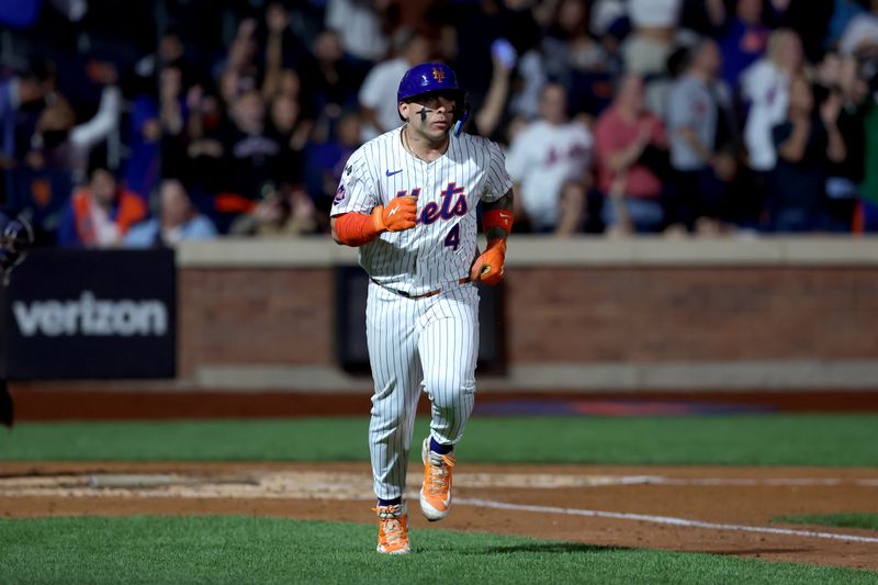 Sep 17, 2024; New York City, New York, USA; New York Mets catcher Francisco Alvarez (4) rounds the bases after hitting a solo home run against the Washington Nationals during the fourth inning at Citi Field. Mandatory Credit: Brad Penner-Imagn Images