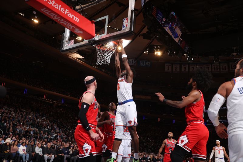 NEW YORK, NY - JANUARY 3: OG Anunoby #8 of the New York Knicks dunks the ball during the game against the Chicago Bulls on January 3, 2024 at Madison Square Garden in New York City, New York.  NOTE TO USER: User expressly acknowledges and agrees that, by downloading and or using this photograph, User is consenting to the terms and conditions of the Getty Images License Agreement. Mandatory Copyright Notice: Copyright 2024 NBAE  (Photo by Nathaniel S. Butler/NBAE via Getty Images)