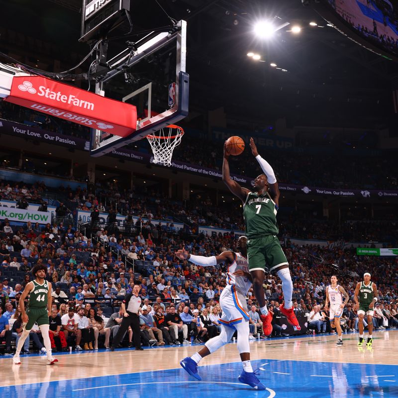 OKLAHOMA CITY, OK - APRIL 12: Chris Livingston #7 of the Milwaukee Bucks drives to the basket during the game against the Oklahoma City Thunder on April 12, 2024 at Paycom Arena in Oklahoma City, Oklahoma. NOTE TO USER: User expressly acknowledges and agrees that, by downloading and or using this photograph, User is consenting to the terms and conditions of the Getty Images License Agreement. Mandatory Copyright Notice: Copyright 2024 NBAE (Photo by Zach Beeker/NBAE via Getty Images)