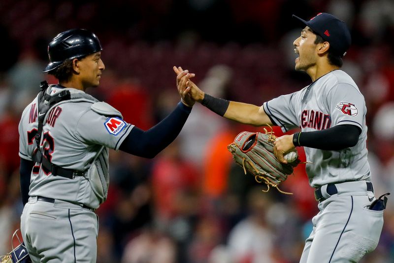 Aug 15, 2023; Cincinnati, Ohio, USA; Cleveland Guardians left fielder Steven Kwan (38) high fives catcher Bo Naylor (23) after the victory over the Cincinnati Reds at Great American Ball Park. Mandatory Credit: Katie Stratman-USA TODAY Sports