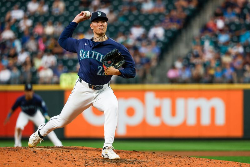 Aug 8, 2024; Seattle, Washington, USA; Seattle Mariners starting pitcher Bryan Woo (22) throws against the Detroit Tigers during the seventh inning at T-Mobile Park. Mandatory Credit: Joe Nicholson-USA TODAY Sports