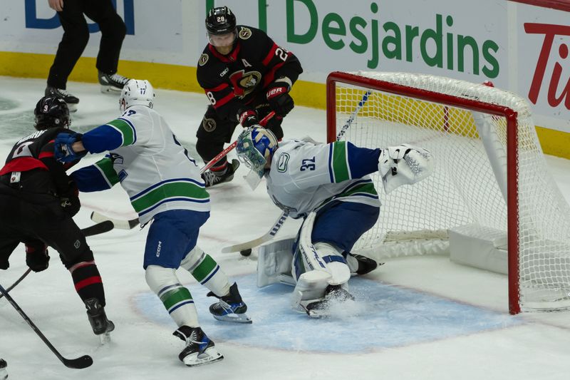 Nov 23, 2024; Ottawa, Ontario, CAN; Ottawa Senators right wing Claude Giroux (28) shoots on Vancouver Canucks goalie Kevin Lankinen (32) in the third period at the Canadian Tire Centre. Mandatory Credit: Marc DesRosiers-Imagn Images