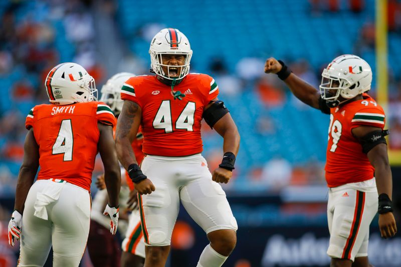 Sep 3, 2022; Miami Gardens, Florida, USA; Miami Hurricanes defensive lineman Antonio Moultrie (44) reacts after sacking Bethune Cookman Wildcats quarterback Walter Simmons III (not pictured) during the fourth quarter at Hard Rock Stadium. Mandatory Credit: Sam Navarro-USA TODAY Sports