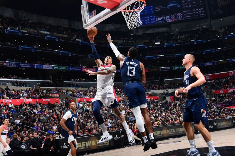 LOS ANGELES, CA - MARCH 1: Kyle Kuzma #33 of the Washington Wizards drives to the basket during the game against the LA Clippers on March 1, 2024 at Crypto.Com Arena in Los Angeles, California. NOTE TO USER: User expressly acknowledges and agrees that, by downloading and/or using this Photograph, user is consenting to the terms and conditions of the Getty Images License Agreement. Mandatory Copyright Notice: Copyright 2024 NBAE (Photo by Adam Pantozzi/NBAE via Getty Images)