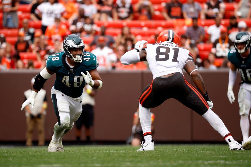 Philadelphia Eagles linebacker Patrick Johnson (48) looks to run past Cleveland Browns tight end Zaire Mitchell-Paden (81) during an NFL preseason football game, Sunday, Aug. 21, 2022, in Cleveland. (AP Photo/Kirk Irwin)