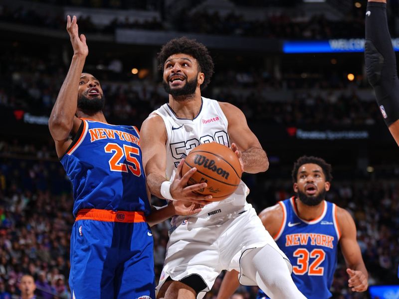 DENVER, CO - NOVEMBER 25: Jamal Murray #27 of the Denver Nuggets drives to the basket during the game against the New York Knicks on November 25, 2024 at Ball Arena in Denver, Colorado. NOTE TO USER: User expressly acknowledges and agrees that, by downloading and/or using this Photograph, user is consenting to the terms and conditions of the Getty Images License Agreement. Mandatory Copyright Notice: Copyright 2024 NBAE (Photo by Garrett Ellwood/NBAE via Getty Images)