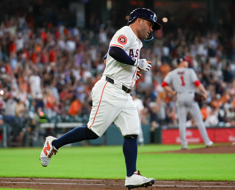 Jul 30, 2025; Houston, Texas, USA; Houston Astros second baseman Jose Altuve (27) rounds the bases after hitting a three run home run against Washington Nationals starting pitcher MacKenzie Gore (1) in the second inning at Daikin Park. Mandatory Credit: Thomas Shea-Imagn Images