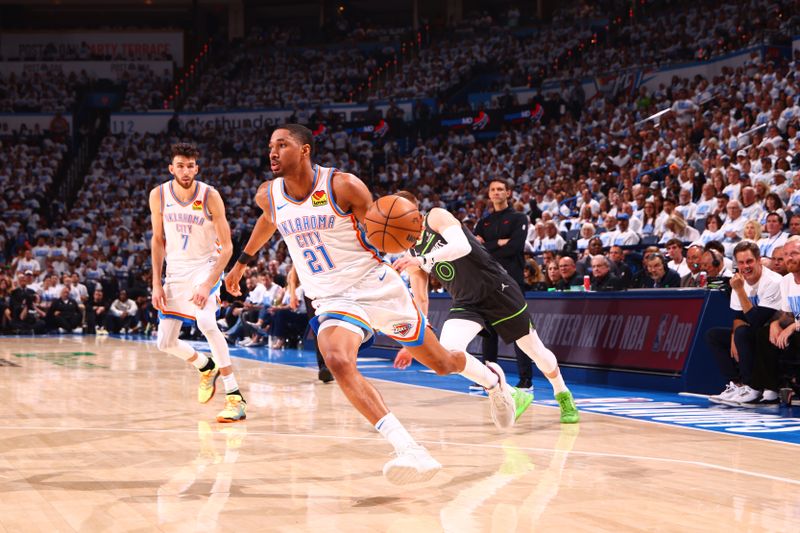 OKLAHOMA CITY, OK - MAY 20: Aaron Wiggins #21 of the Oklahoma City Thunder drives to the basket during the game against the Minnesota Timberwolves during Game 1 of the 2025 Western Conference Finals on May 20, 2025 at Paycom Center in Oklahoma City, Oklahoma. NOTE TO USER: User expressly acknowledges and agrees that, by downloading and or using this photograph, User is consenting to the terms and conditions of the Getty Images License Agreement. Mandatory Copyright Notice: Copyright 2025 NBAE (Photo by Zach Beeker/NBAE via Getty Images)