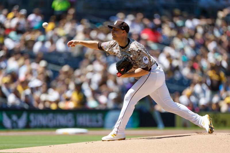 Apr 12, 2025; San Diego, California, USA;  San Diego Padres starting pitcher Michael King (34) throws a pitch during the first inning against the Colorado Rockies at Petco Park. Mandatory Credit: David Frerker-Imagn Images