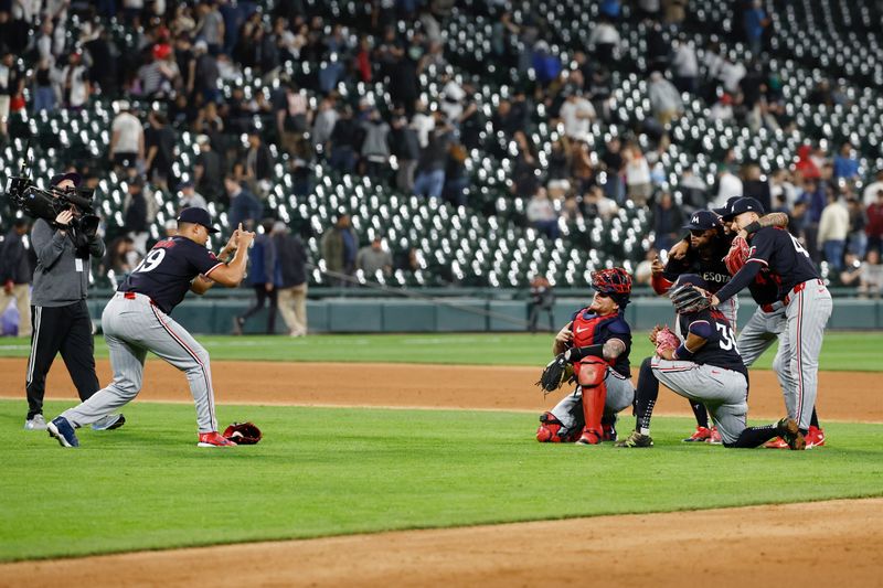 Apr 30, 2024; Chicago, Illinois, USA; Minnesota Twins players celebrate after defeating the Chicago White Sox at Guaranteed Rate Field. Mandatory Credit: Kamil Krzaczynski-USA TODAY Sports