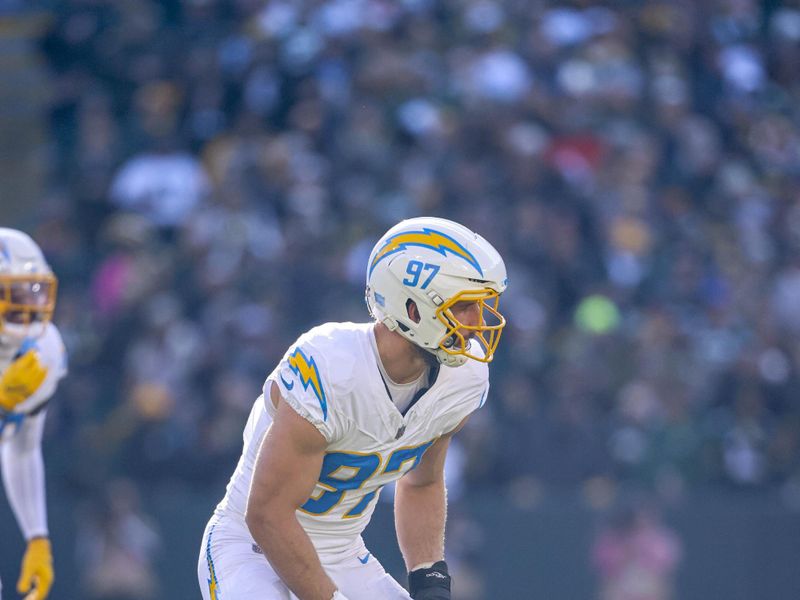 Los Angeles Chargers linebacker Joey Bosa (97) on defense during an NFL football game against the Green Bay Packers Sunday, Nov. 19, 2023, in Green Bay, Wis. (AP Photo/Jeffrey Phelps