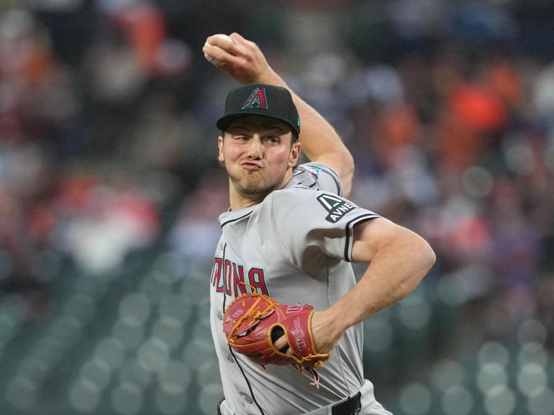 May 10, 2024; Baltimore, Maryland, USA; Arizona Diamondbacks pitcher Brandon Pfaadt (32) delivers in the first inning against the Baltimore Orioles at Oriole Park at Camden Yards. Mandatory Credit: Mitch Stringer-USA TODAY Sports