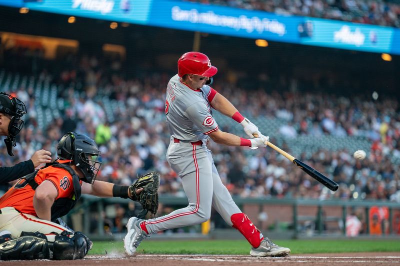 May 10, 2024; San Francisco, California, USA; Cincinnati Reds first baseman Spencer Steer (7) hits a RBI double against the San Francisco Giants during the first inning at Oracle Park. Mandatory Credit: Neville E. Guard-USA TODAY Sports