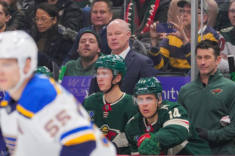 Nov 28, 2023; Saint Paul, Minnesota, USA; Minnesota Wild head coach John Hynes on the bench against the St. Louis Blues in the second period at Xcel Energy Center. Mandatory Credit: Brad Rempel-USA TODAY Sports