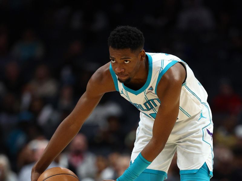 CHARLOTTE, NORTH CAROLINA - FEBRUARY 07: Brandon Miller #24 of the Charlotte Hornets dribbles during the second half of the game against the Toronto Raptorsat Spectrum Center on February 07, 2024 in Charlotte, North Carolina. NOTE TO USER: User expressly acknowledges and agrees that, by downloading and or using this photograph, User is consenting to the terms and conditions of the Getty Images License Agreement. (Photo by Jared C. Tilton/Getty Images)