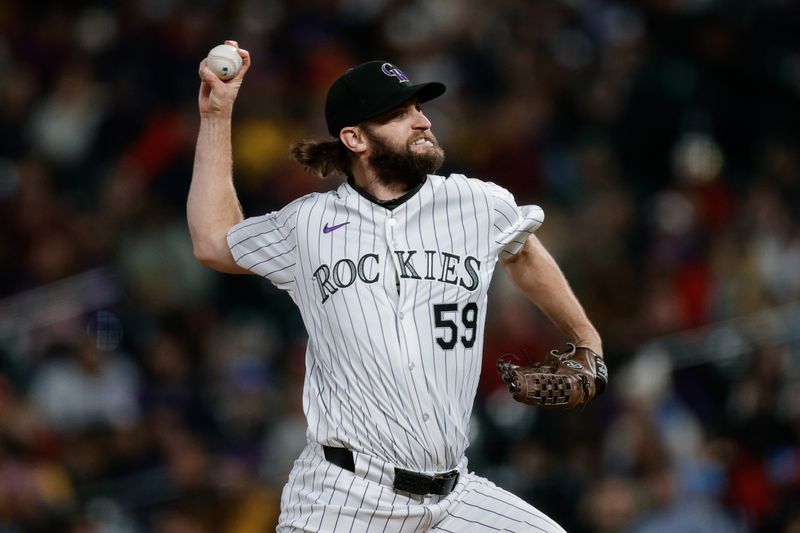 May 10, 2024; Denver, Colorado, USA; Colorado Rockies relief pitcher Jake Bird (59) pitches in the eighth inning against the Texas Rangers at Coors Field. Mandatory Credit: Isaiah J. Downing-USA TODAY Sports