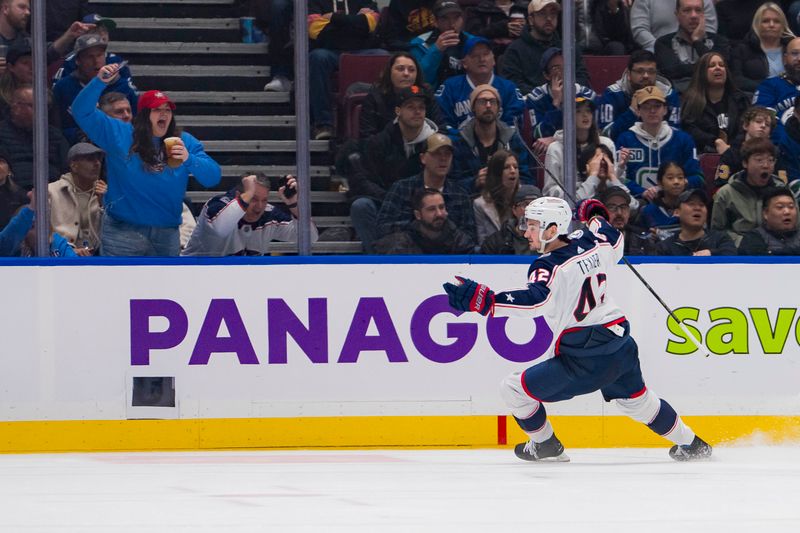 Jan 27, 2024; Vancouver, British Columbia, CAN; Columbus Blue Jackets forward Alexandre Texier (42) celebrates his goal against the Vancouver Canucks in the second period at Rogers Arena. Mandatory Credit: Bob Frid-USA TODAY Sports