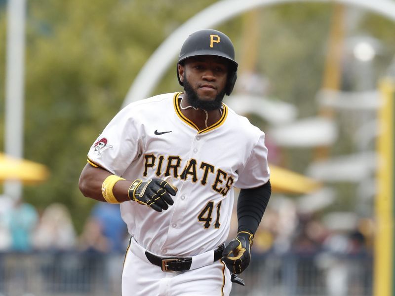 Sep 26, 2024; Pittsburgh, Pennsylvania, USA;  Pittsburgh Pirates right fielder Bryan De La Cruz (41) circles the bases on a two run home run against the Milwaukee Brewers during the seventh inning at PNC Park. The Brewers won 5-2. Mandatory Credit: Charles LeClaire-Imagn Images