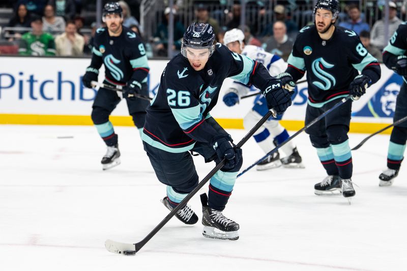 Mar 17, 2026; Seattle, Washington, USA; Seattle Kraken forward Ryan Winterton (26) skates with the puck during the third period against the Tampa Bay Lightning at Climate Pledge Arena. Mandatory Credit: Stephen Brashear-Imagn Images