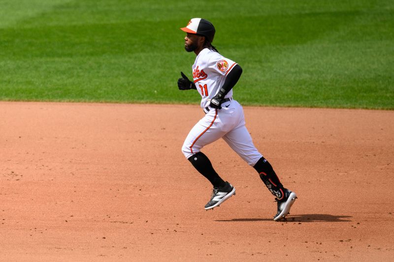 Aug 27, 2023; Baltimore, Maryland, USA; Baltimore Orioles center fielder Cedric Mullins (31) rounds the bases after hitting a home run during the fifth inning against against the Colorado Rockies at Oriole Park at Camden Yards. Mandatory Credit: Reggie Hildred-USA TODAY Sports